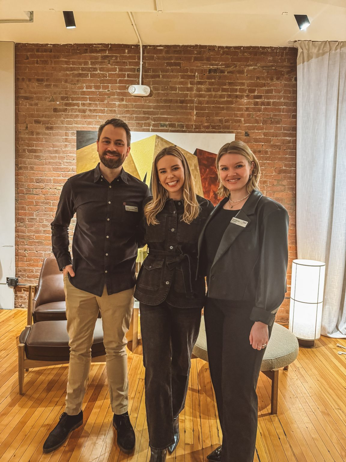 Anne Singer posing with two fellow speakers at a Djøf New York event