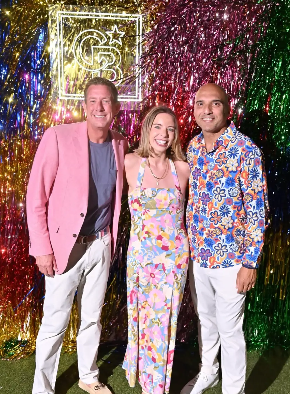 Three people at a Coldwell Banker event
